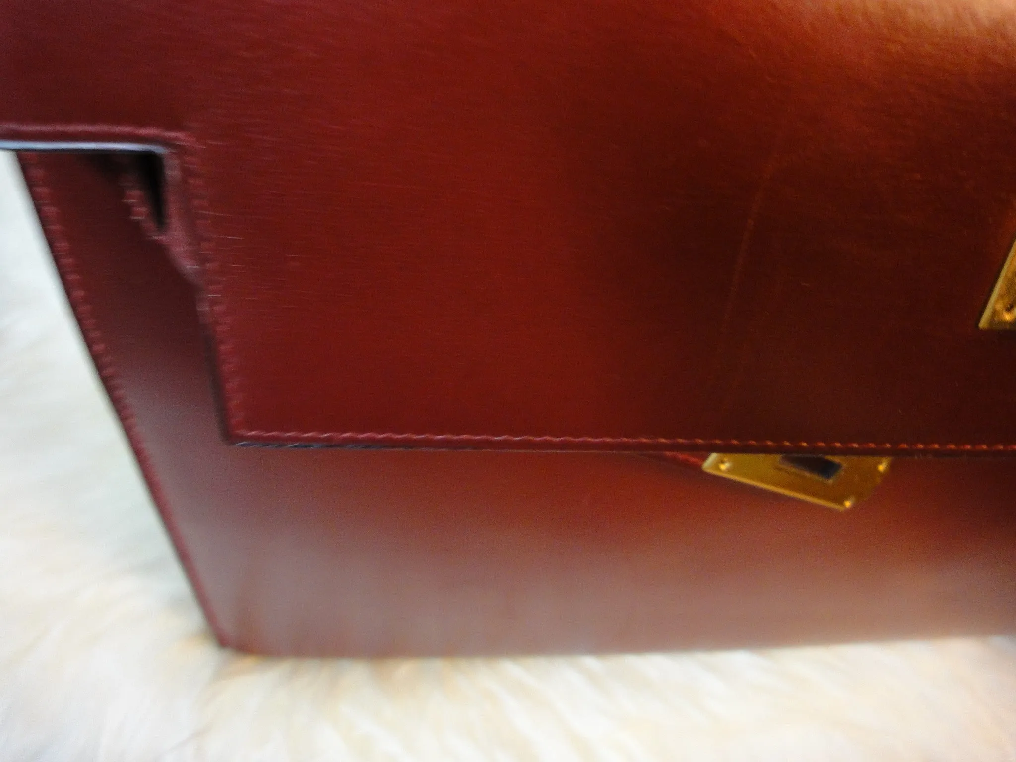 1980s Vintage HERMES Kelly 32 bag rouge ash box calf leather with gold hardware. Exterior stitch. Stamp K in O, 1981. Best known classic bag