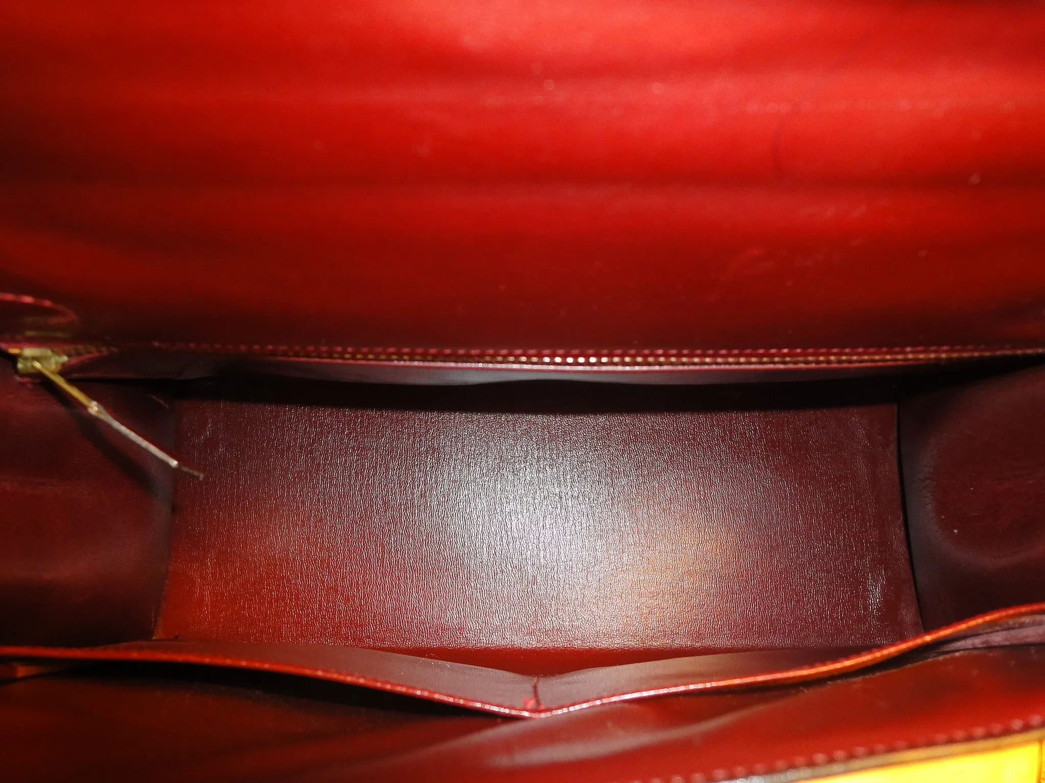1980s Vintage HERMES Kelly 32 bag rouge ash box calf leather with gold hardware. Exterior stitch. Stamp K in O, 1981. Best known classic bag