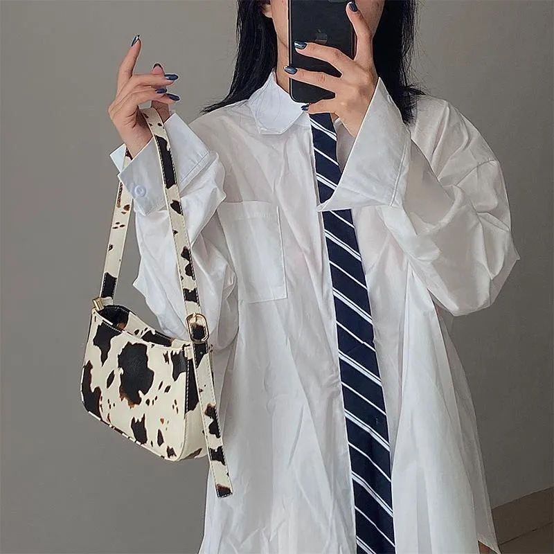 Cow spot pattern shoulder bag