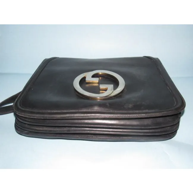 RARE, vintage, supple, black leather, Gucci 'Blondie' saddle bag style shoulder bag with an XL, gold 'GG' logo cut-out